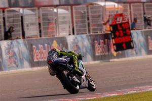 Rossi wins in Argentina after clashing with Marquez