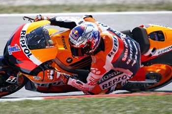 Stoner claims second pole of 2012 season in Spain
